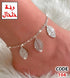 104 - Anklet with filigree leaf charms.