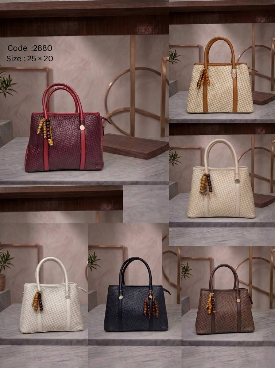 2880 — Tassel Detail Top Handle Bag — detail