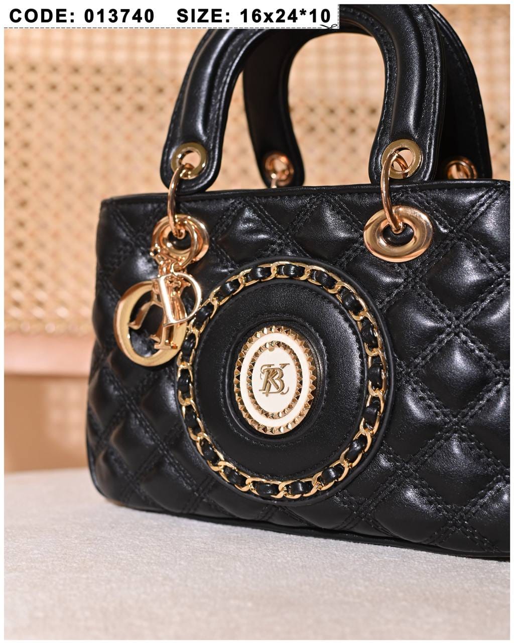 013740 — Quilted Medallion Top Handle Bag — detail