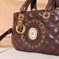 013740 — Quilted Medallion Top Handle Bag — detail