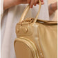 011040 — Gold side-pocket shoulder handbag detail, 24 × 30 × 15 (Gold)