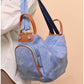 011040 — Denim Blue side-pocket shoulder handbag front, 24 × 30 × 15 (Denim Blue)