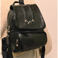 011553 — Black zip-detail backpack front, 30 × 28 × 14 (Black)