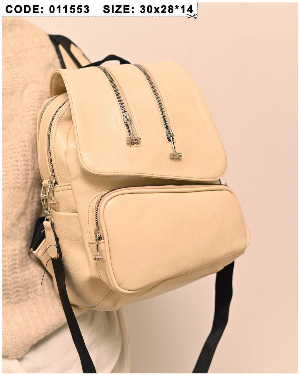 011553 — Cream zip-detail backpack front, 30 × 28 × 14 (Cream)