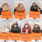 011599 — Mini charm barrel handbag, seven-color overview