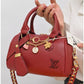 011599 — Red mini charm barrel handbag detail, 14 × 20 × 10 (Red)