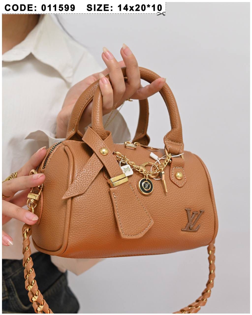 011599 — Tan mini charm barrel handbag detail, 14 × 20 × 10 (Tan)