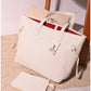 013650 — White embossed tote with matching pouch front, 32 × 48 × 15 (White)