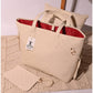 013650 — Cream embossed tote with matching pouch front, 32 × 48 × 15 (Cream)