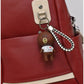 013685 — Red bear-charm backpack detail, 32 × 28 × 12 (Red)