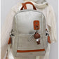013685 — Silver bear-charm backpack front, 32 × 28 × 12 (Silver)