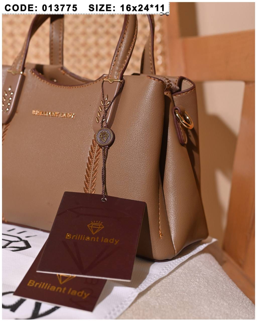 013775 — Taupe structured leaf-detail handbag detail, 16 × 24 × 11 (Taupe)