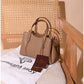 013775 — Taupe structured leaf-detail handbag front, 16 × 24 × 11 (Taupe)