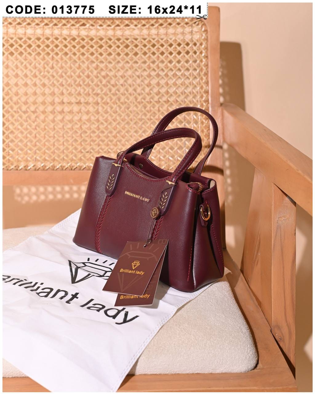 013775 — Burgundy structured leaf-detail handbag front, 16 × 24 × 11 (Burgundy)