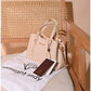 013775 — Beige structured leaf-detail handbag front, 16 × 24 × 11 (Beige)