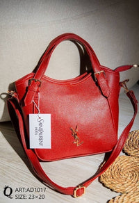 AD1017 — Red buckle-handle handbag front, 23 × 20 (Red)