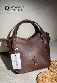 AD1017 — Brown buckle-handle handbag front, 23 × 20 (Brown)
