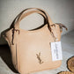 AD1017 — Beige buckle-handle handbag front, 23 × 20 (Beige)