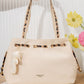 AL112 — Ivory drawstring shoulder bag front, 36 × 25 (Ivory)