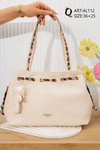 AL112 — Ivory drawstring shoulder bag front, 36 × 25 (Ivory)