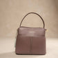 BAG_11 — Taupe textured panel handbag front (Taupe)