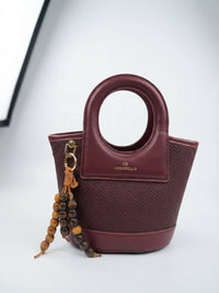 BAG_7 — Burgundy oval-handle bucket handbag front (Burgundy)