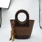 BAG_7 — Brown oval-handle bucket handbag front (Brown)