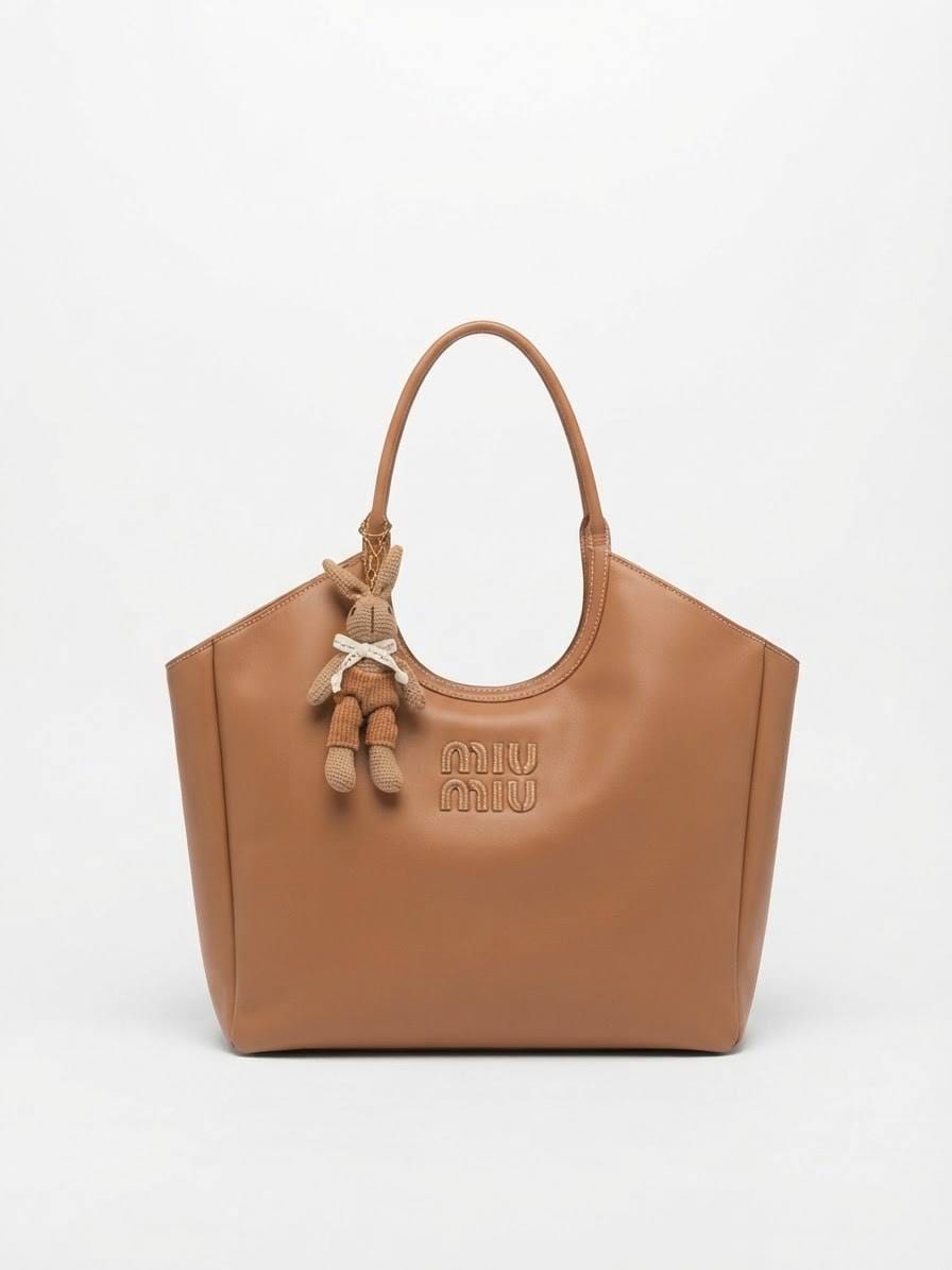 BAG_9 — Tan bunny-charm shoulder tote front (Tan)