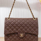 BM125 — Brown quilted chain shoulder bag front, 34 × 24 (Brown)