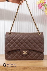 BM125 — Brown quilted chain shoulder bag front, 34 × 24 (Brown)