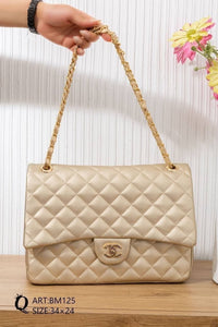 BM125 — Gold quilted chain shoulder bag front, 34 × 24 (Gold)