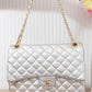 BM125 — Silver quilted chain shoulder bag front, 34 × 24 (Silver)