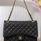 BM125 — Black quilted chain shoulder bag front, 34 × 24 (Black)