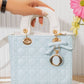 Bm307 — Light Blue / White quilted top handle bag front, 22 × 19 (Light Blue / White)