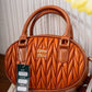 EB494 — Brown quilted handbag front, 23 × 17 (Brown)