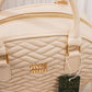 EB494 — Ivory quilted handbag detail, 23 × 17 (Ivory)