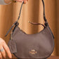 FR03 — Brown crescent shoulder bag front (Brown)