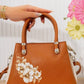 Mk151 — Tan floral top-handle handbag front, 24 × 17 (Tan)