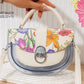 Ms518 — Cream floral transparent-panel handbag front, 22 × 15 (Cream)