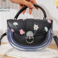 Ms518 — Black floral transparent-panel handbag front, 22 × 15 (Black)