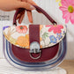 Ms518 — Burgundy floral transparent-panel handbag front, 22 × 15 (Burgundy)