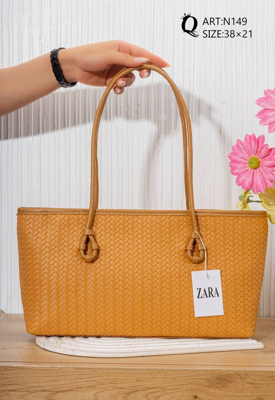 N149 — Tan woven-pattern shoulder tote front, 38 × 21 (Tan)