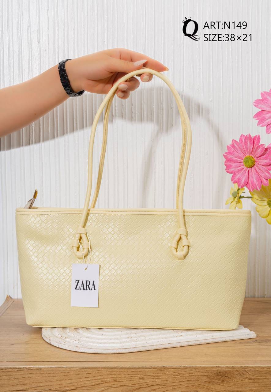 N149 — Pale Yellow woven-pattern shoulder tote front, 38 × 21 (Pale Yellow)
