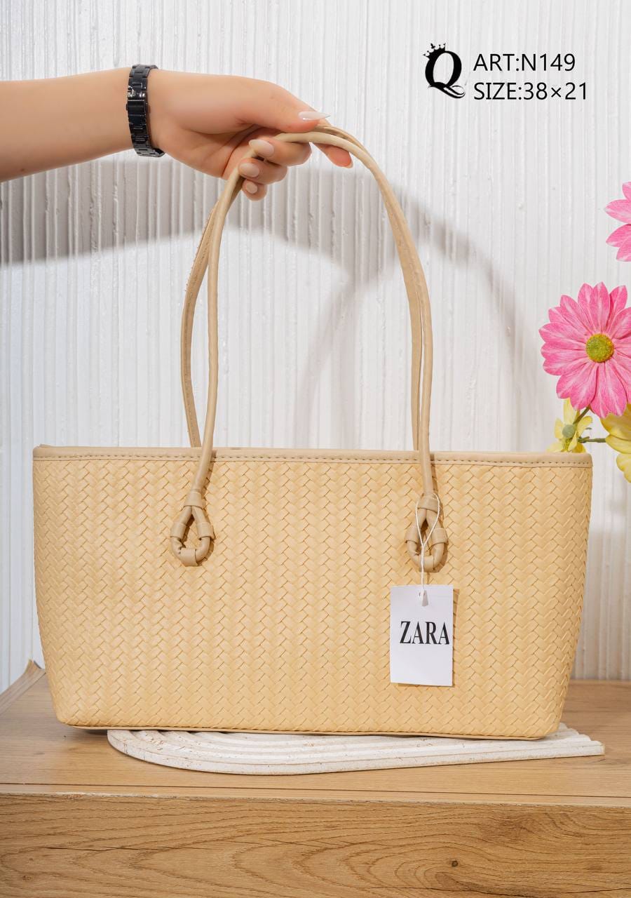N149 — Sand woven-pattern shoulder tote front, 38 × 21 (Sand)