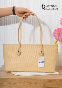 N149 — Sand woven-pattern shoulder tote front, 38 × 21 (Sand)