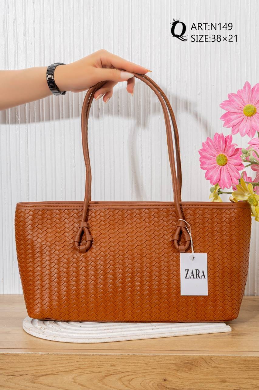 N149 — Cognac woven-pattern shoulder tote front, 38 × 21 (Cognac)