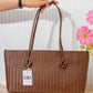 N149 — Brown woven-pattern shoulder tote front, 38 × 21 (Brown)
