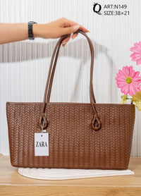 N149 — Brown woven-pattern shoulder tote front, 38 × 21 (Brown)