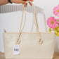 N149 — Cream woven-pattern shoulder tote front, 38 × 21 (Cream)