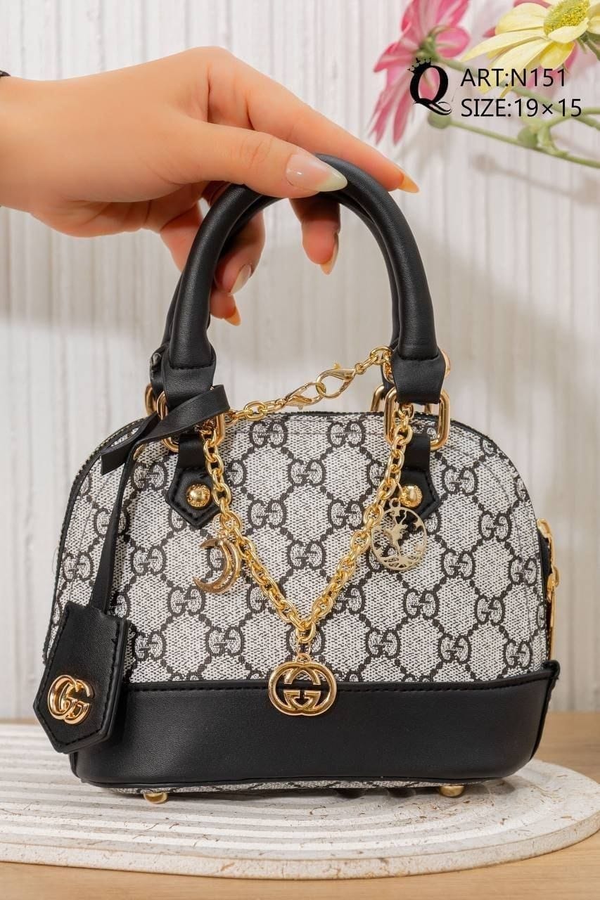 N151 — Black and White mini patterned handbag front, 19 × 15 (Black and White)